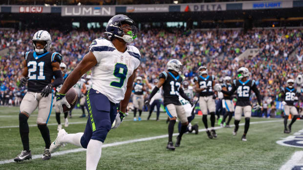 Sep 24, 2023; Seattle, Washington, USA; Seattle Seahawks running back Kenneth Walker III (9) celebrates after rushing for a touchdown against the Carolina Panthers during the fourth quarter at Lumen Field. Mandatory Credit: Joe Nicholson-USA TODAY Sports